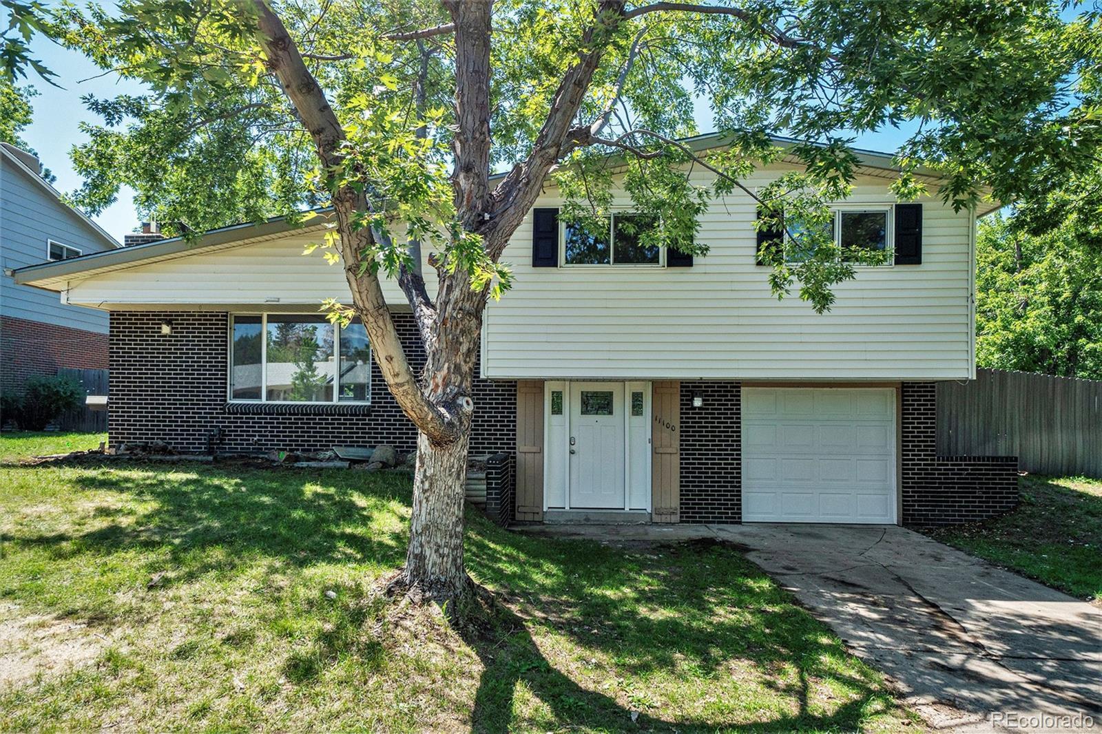 Property Photo:  11100 E Wesley Avenue  CO 80014 