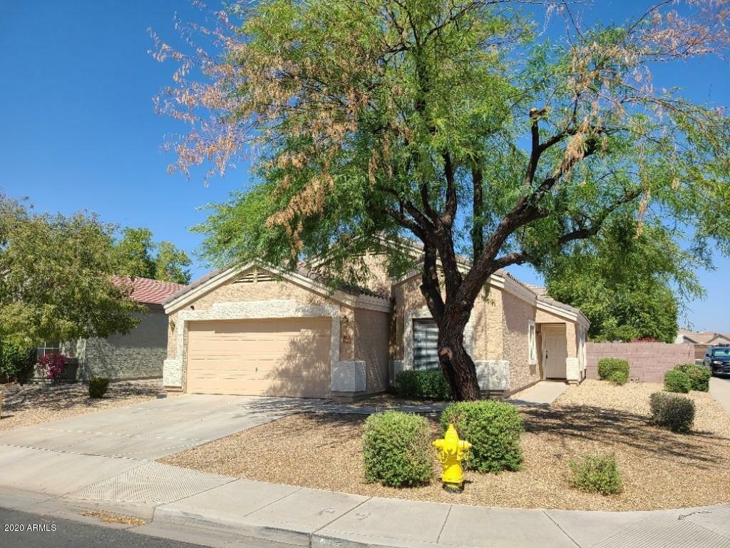 Property Photo: 12702 W Wells Street AZ 85335