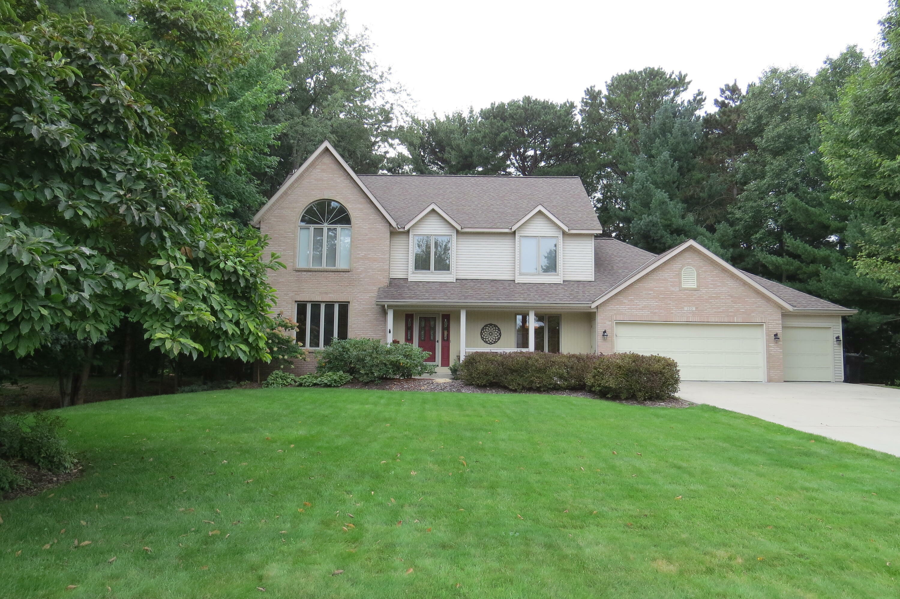 Property Photo:  322 Erin Isle Drive  MI 49424 