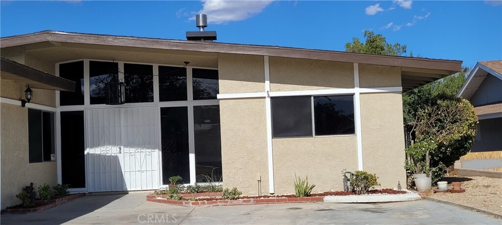 Property Photo: 14157 Wimbleton Drive CA 92395