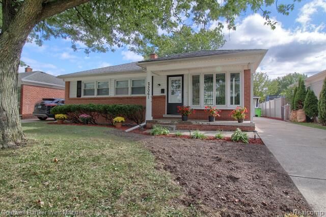 Property Photo: 25061 Gibraltar Road MI 48134