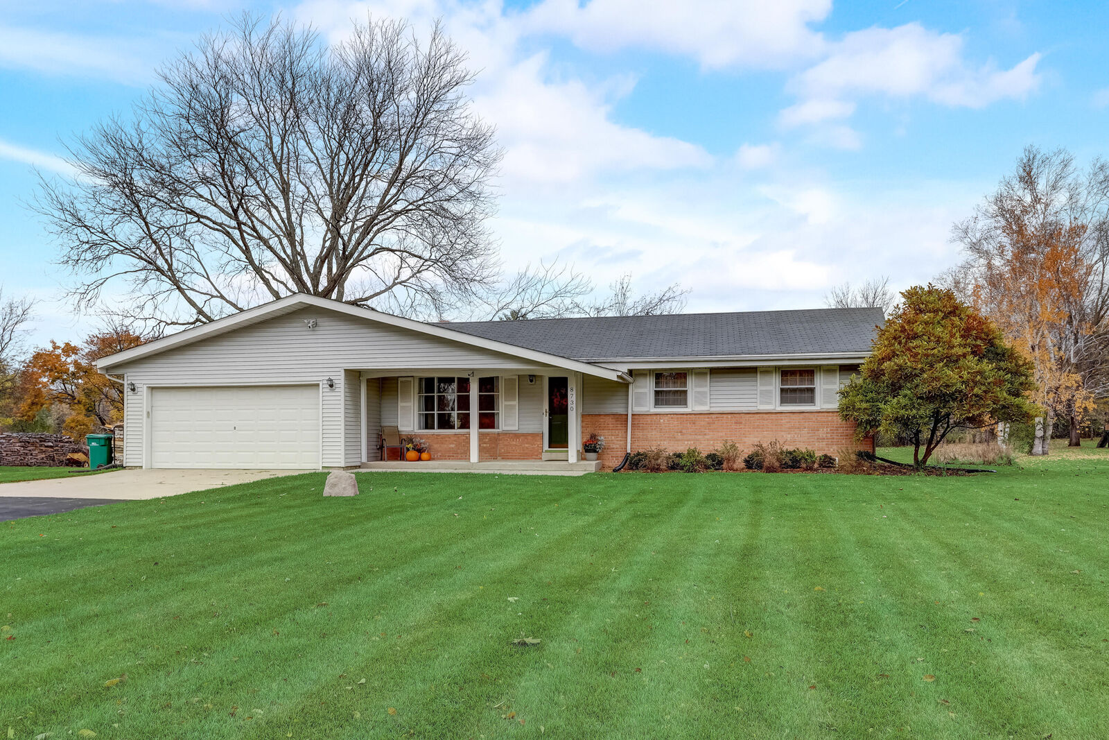 Property Photo:  8730 W Holly Rd  WI 53097 