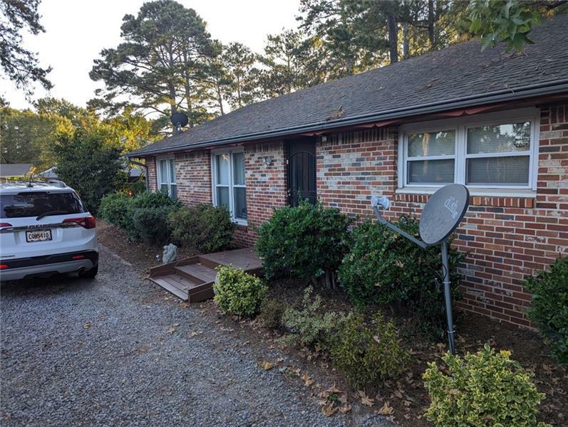 Property Photo:  2424 Benson Poole Road SE  GA 30082 