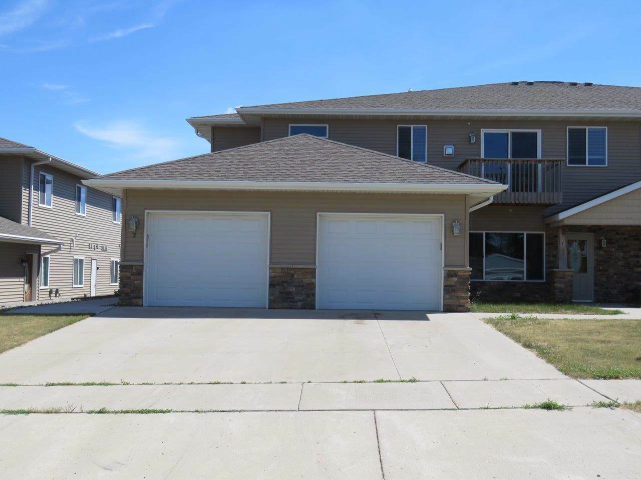 Property Photo: 19 43rd Ave SW Unit #2 ND 58701