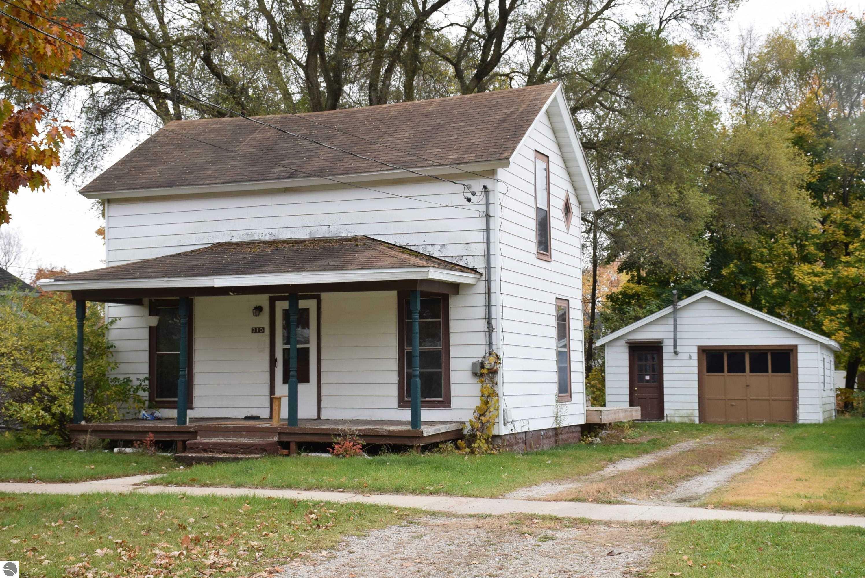 Property Photo:  310 Palmer Street  MI 48858 