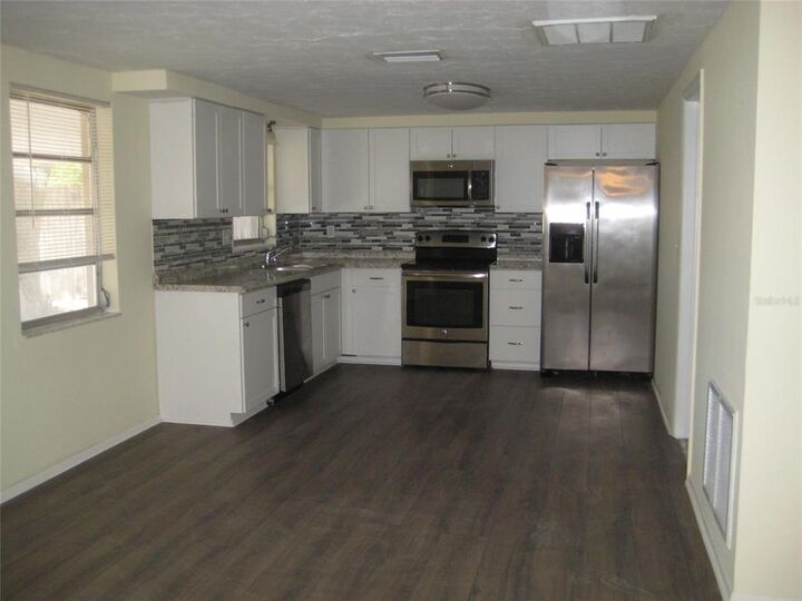 Property Photo:  4839 Alcea St  FL 34652 