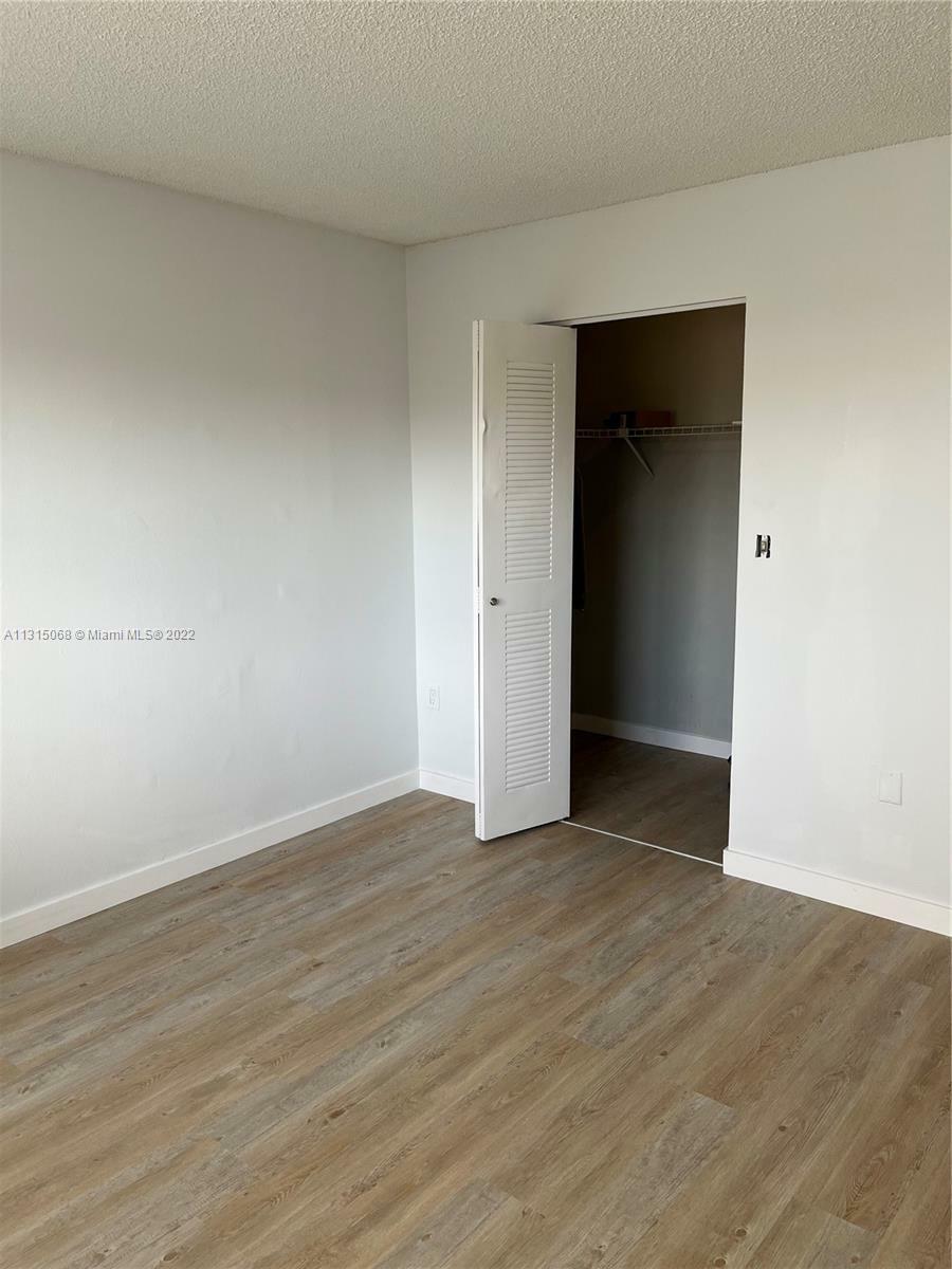 Property Photo:  7090 NW 179th St 303  FL 33015 