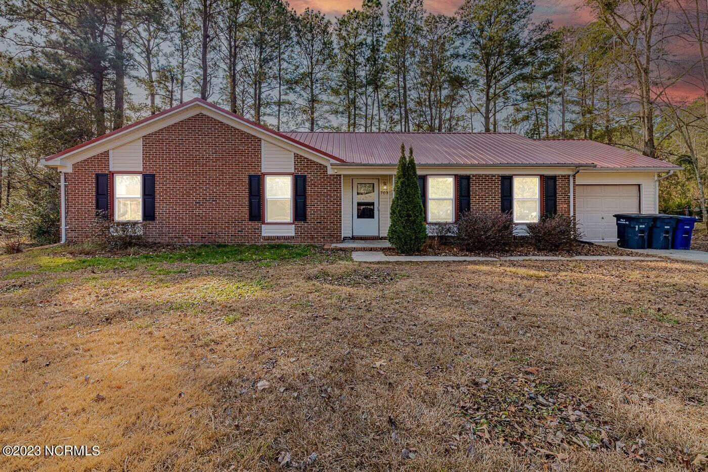 Property Photo:  703 Shadowridge Road  NC 28546 