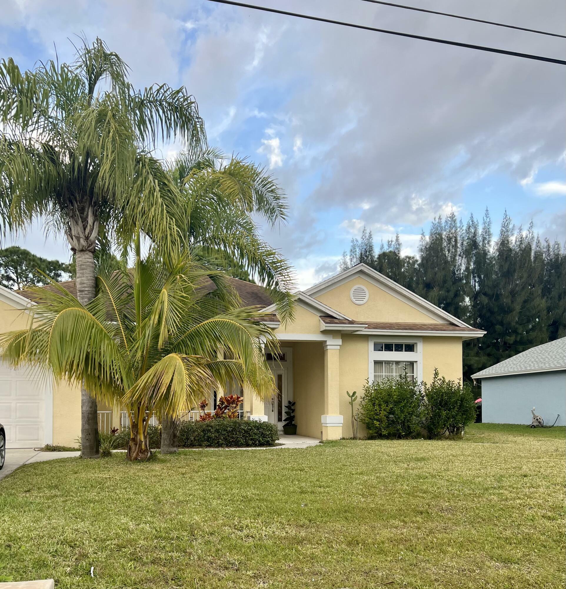 Property Photo:  6769 NW Omega Road  FL 34983 