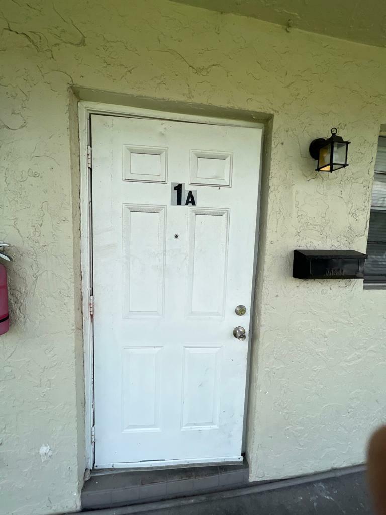 Property Photo:  440 NE 30th Street 1-4  FL 33064 