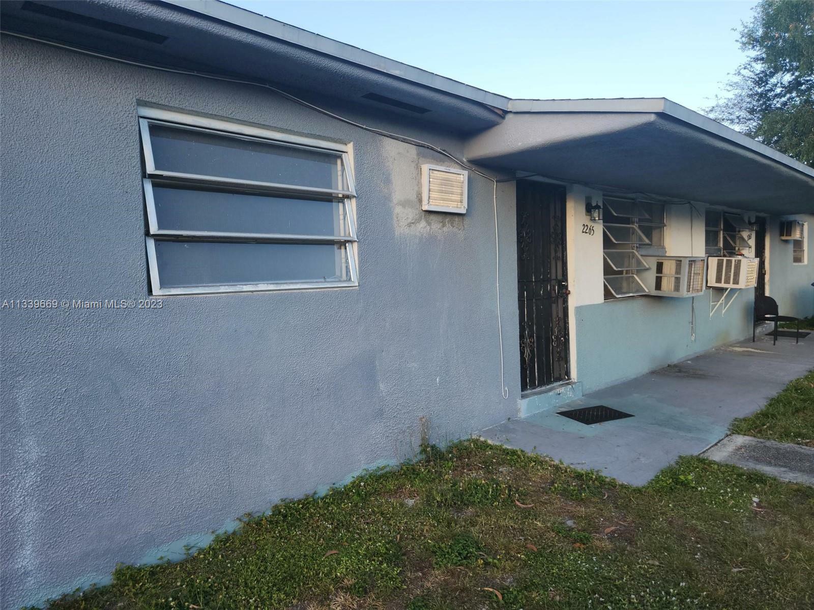 Property Photo:  2263 NW 98th St 2265  FL 33147 