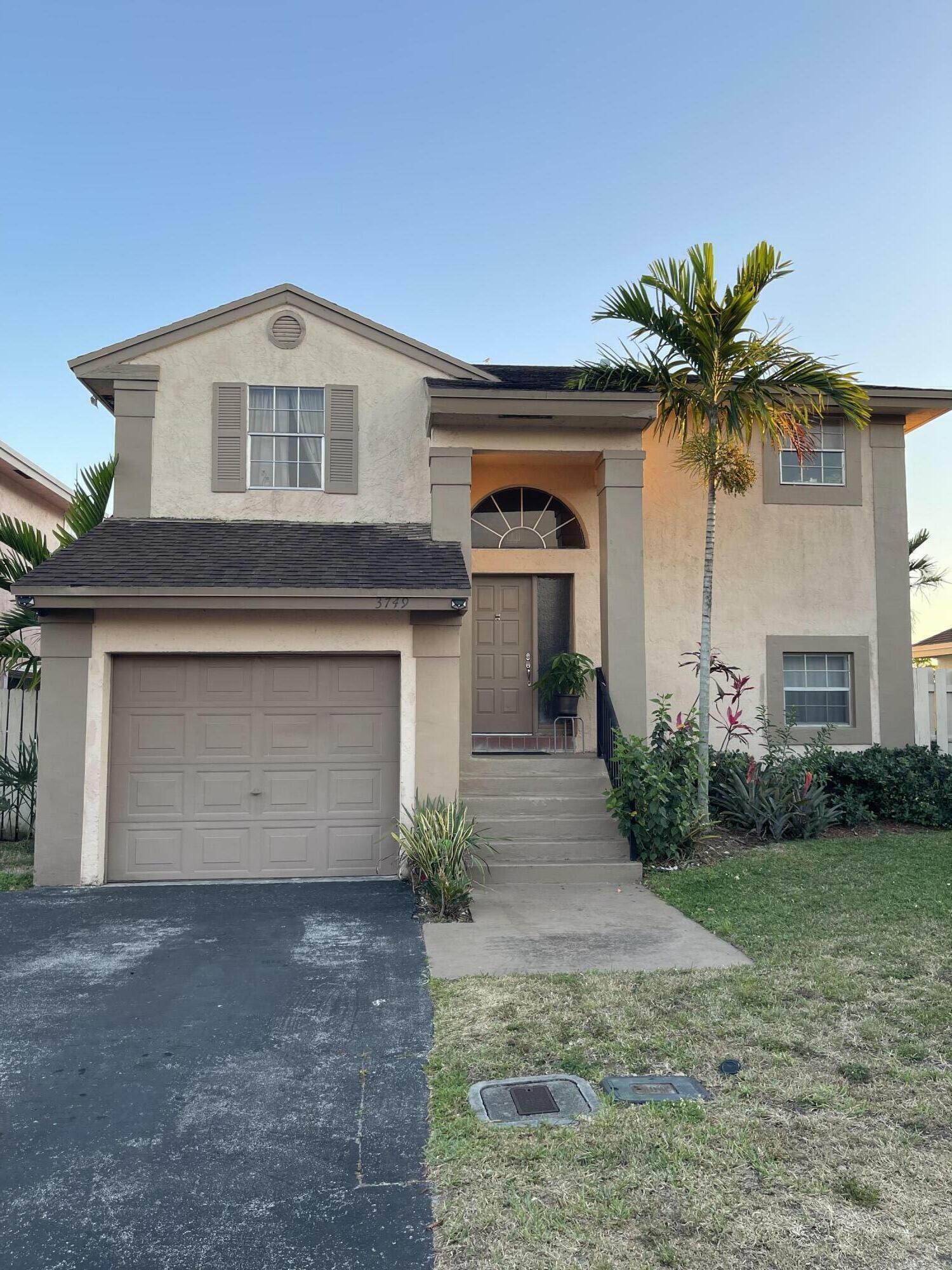 Property Photo: 3749 NW 107th Way FL 33351