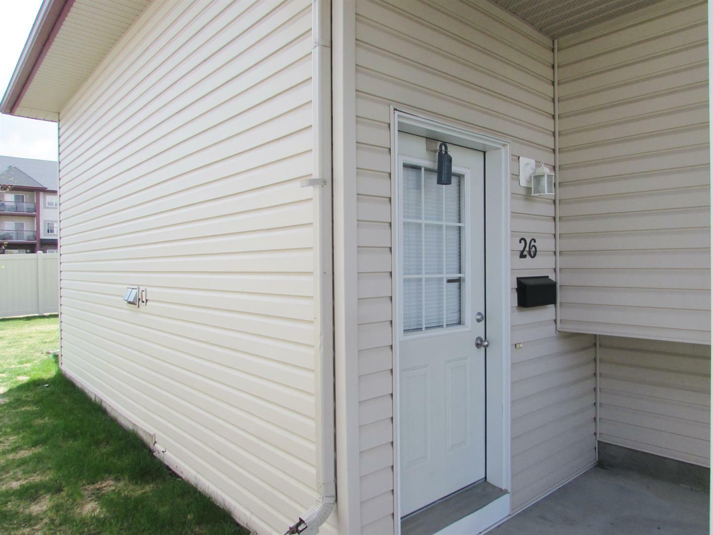 Property Photo: 26, 103 Addington Drive 26 AB T4R 3C6