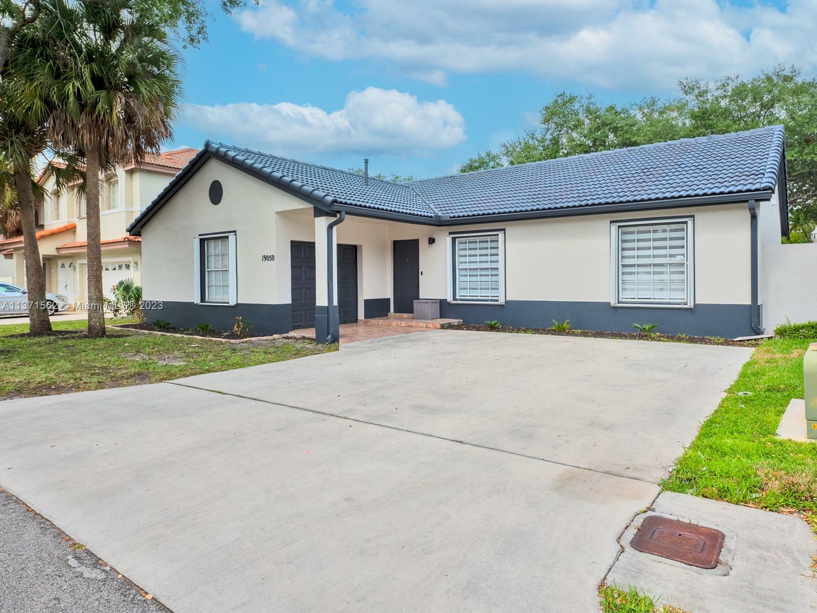Property Photo: 19050 NW 89th Ct FL 33018