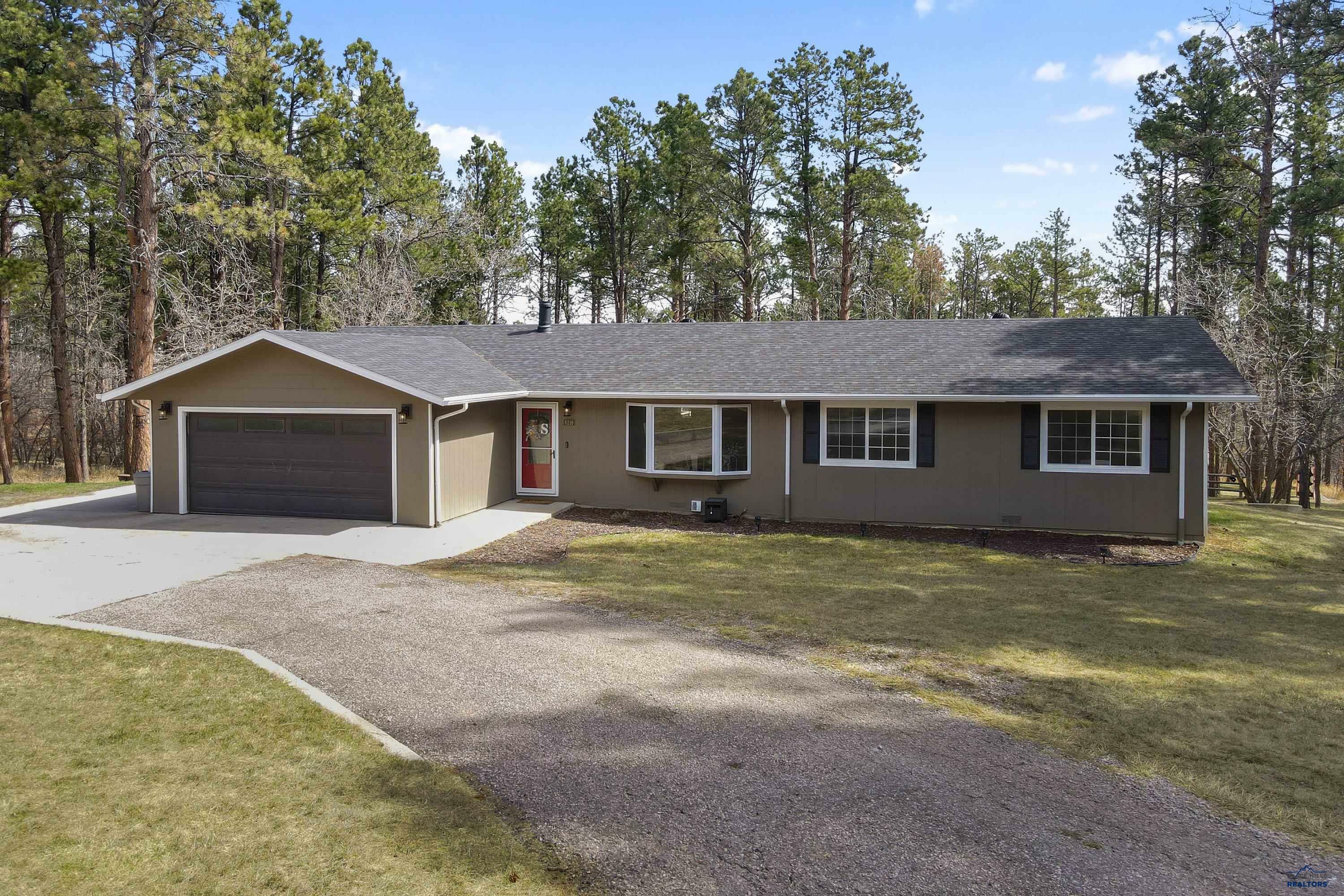 Property Photo: 8216 Chickadee Ln SD 57718