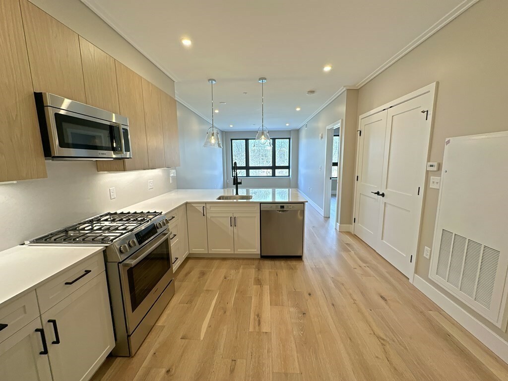 Property Photo:  70 Leo M Birmingham Parkway 206  MA 02135 