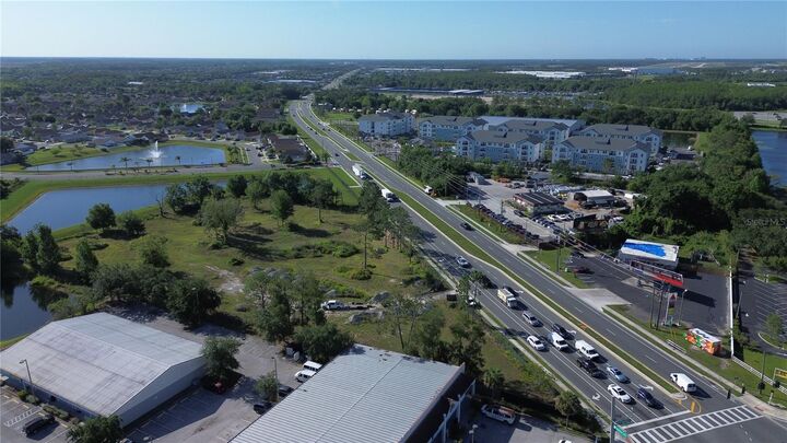 Property Photo:  6347 Narcoossee Road  FL 32822 