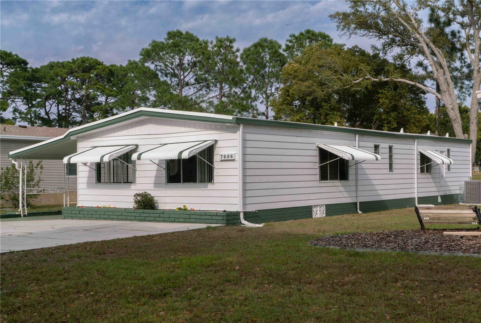 Property Photo:  7606 Dinsmore Street  FL 34613 