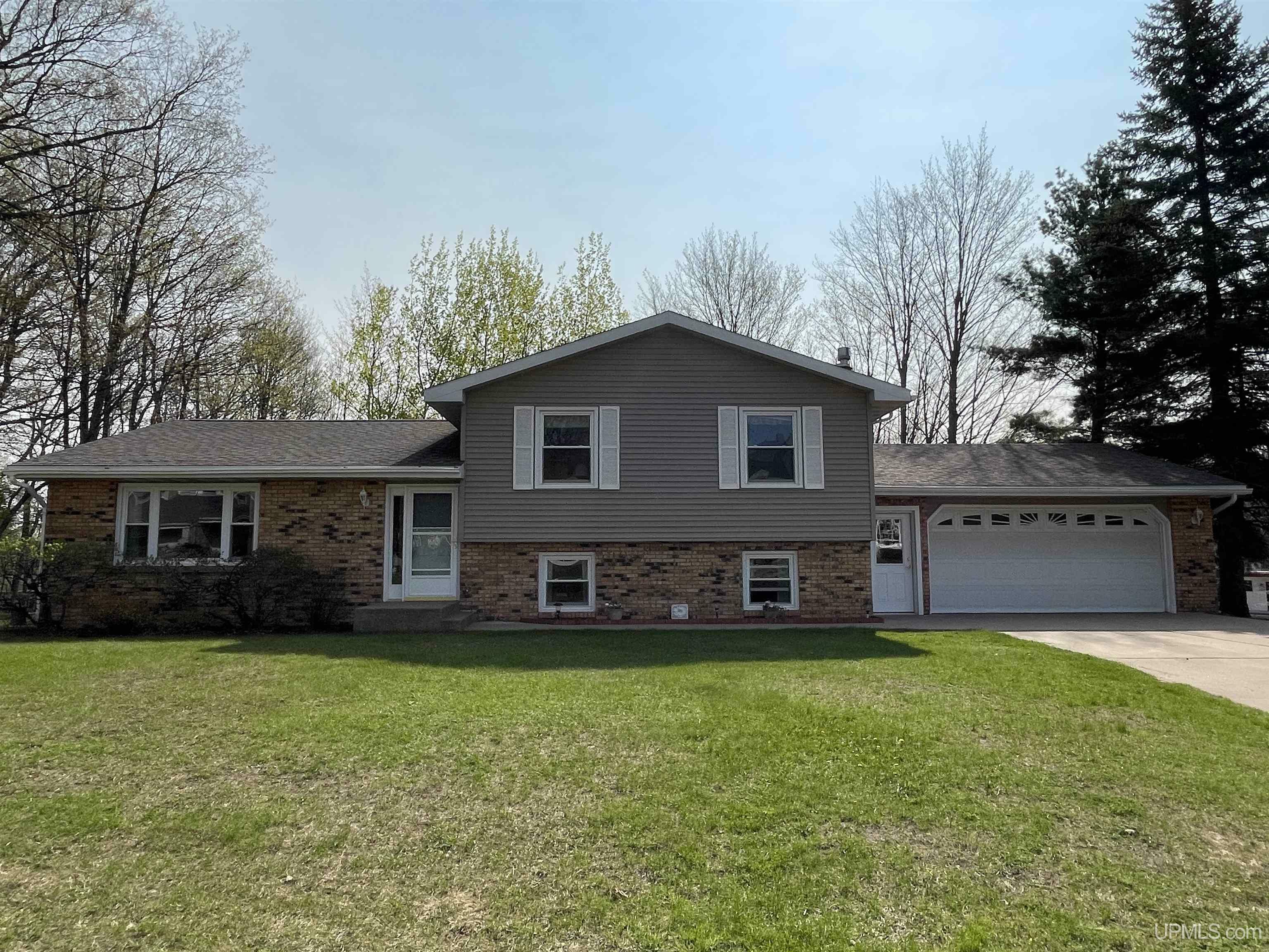 Property Photo:  18 Grove Hill  MI 49855 