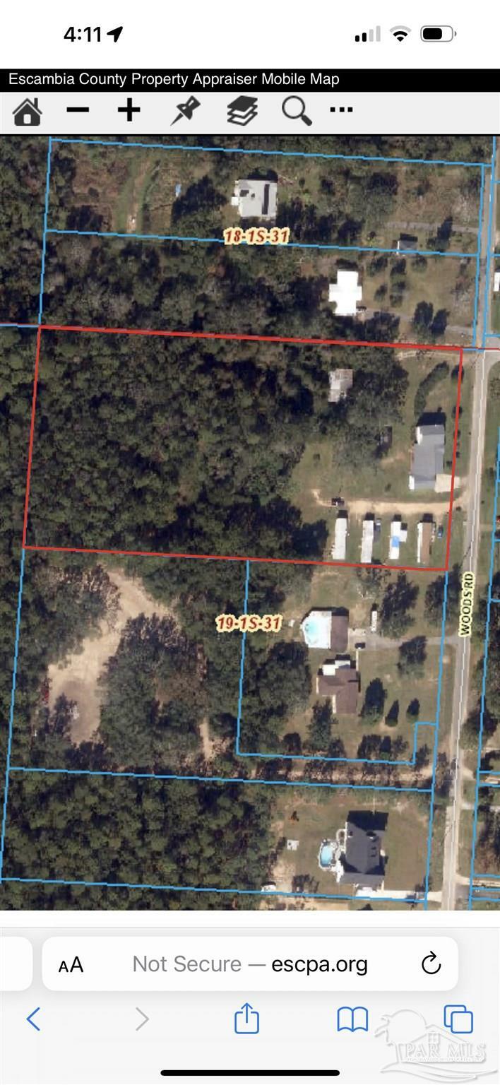 Property Photo: 7501 Woods Rd FL 32526