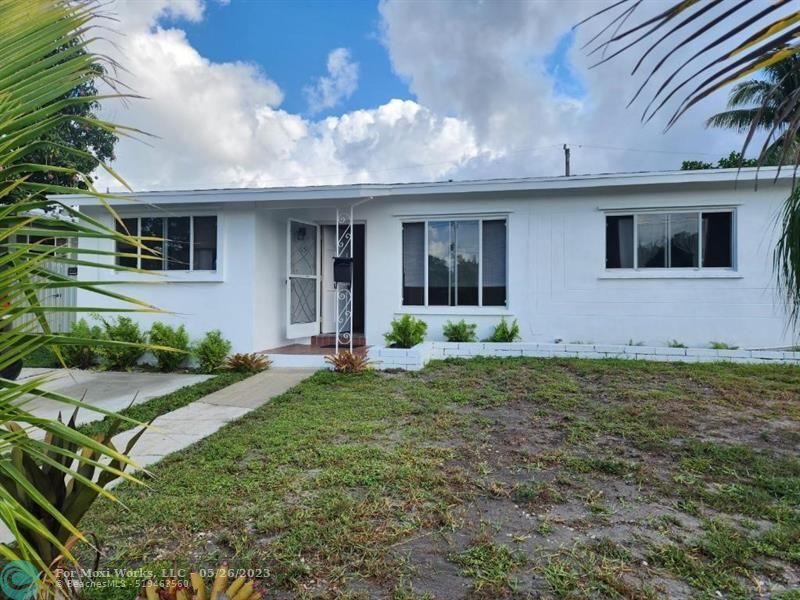 Property Photo: 65 NE 56th Ct FL 33334