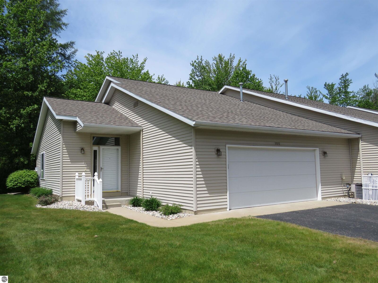 Property Photo:  308 Woodside Circle  MI 49601 