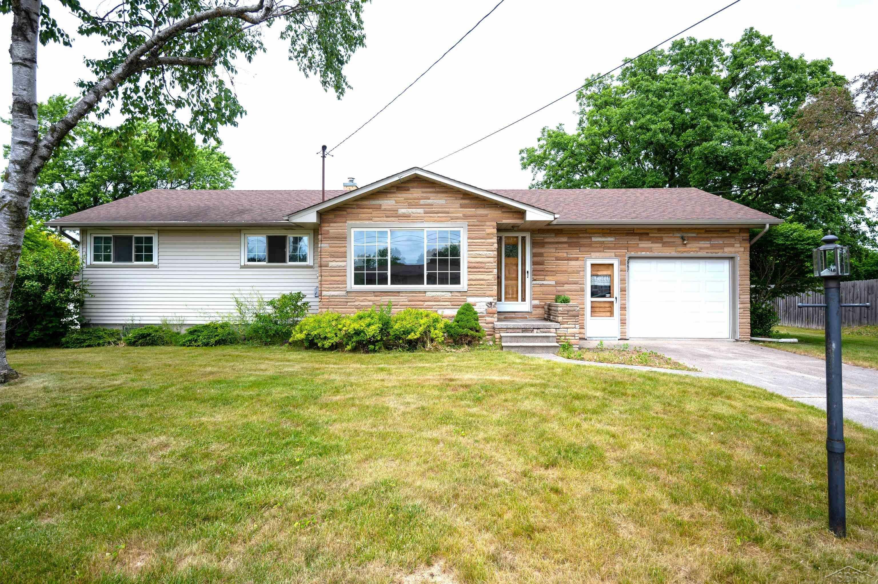 Property Photo:  2967 Cadillac Dr.  MI 48706 