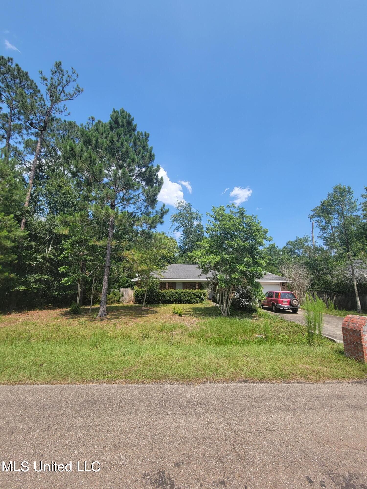 Property Photo:  9977 Kahana Street  MS 39525 