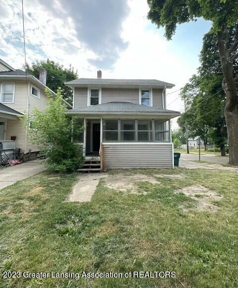 Property Photo:  1415 N High Street  MI 48906 