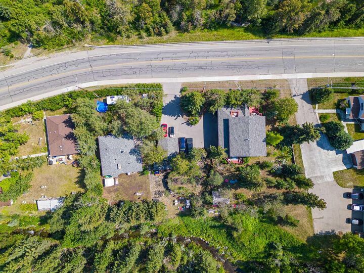 Property Photo: 107 Three Sisters Drive AB T1W 2M3