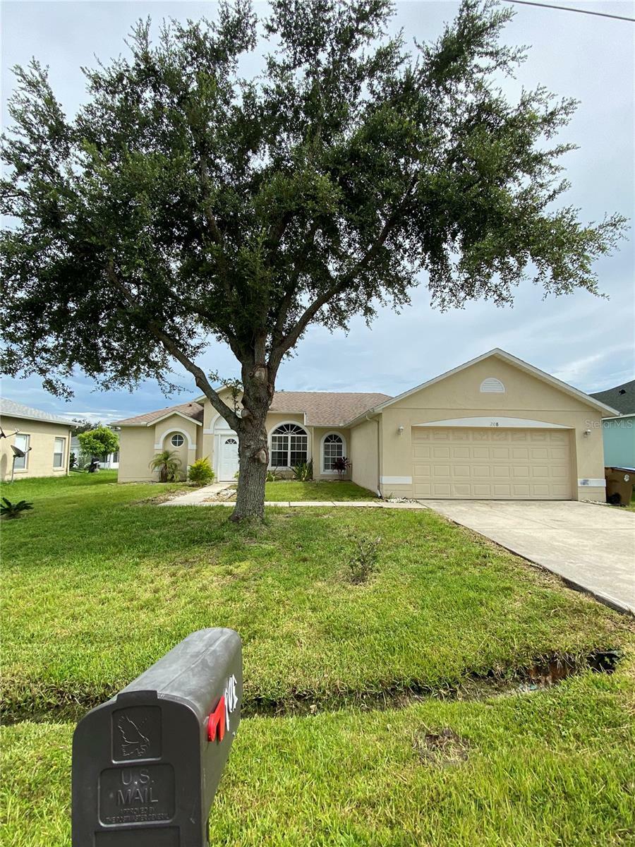 Property Photo: 208 Abbotsbury Drive FL 34758