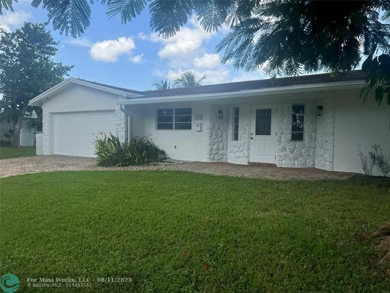 Property Photo:  420 NW 43rd Ave  FL 33066 