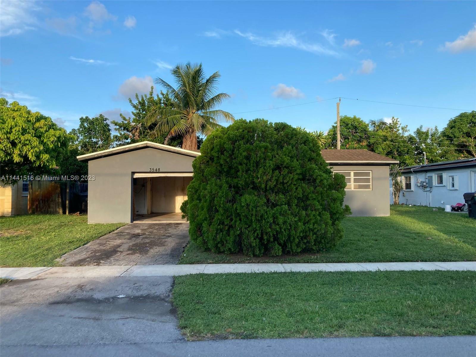 Property Photo:  3548 NW 37th Ave  FL 33309 