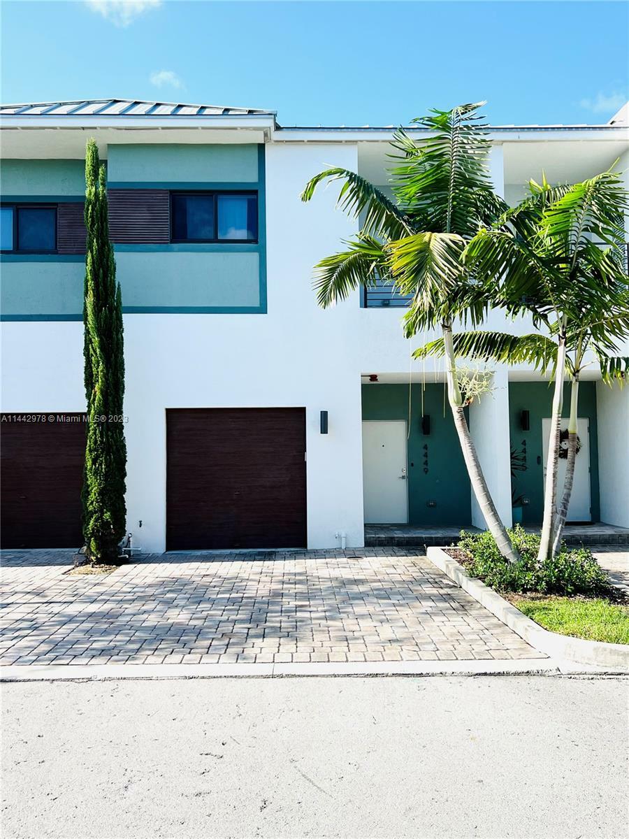 Property Photo:  4449 NW 9th St 4449  FL 33317 