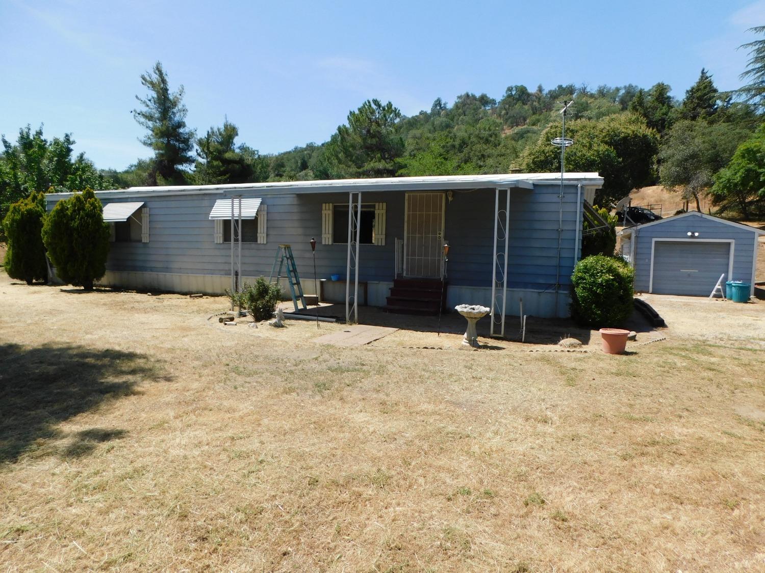 Property Photo:  47632 Creekside Road  CA 93675 