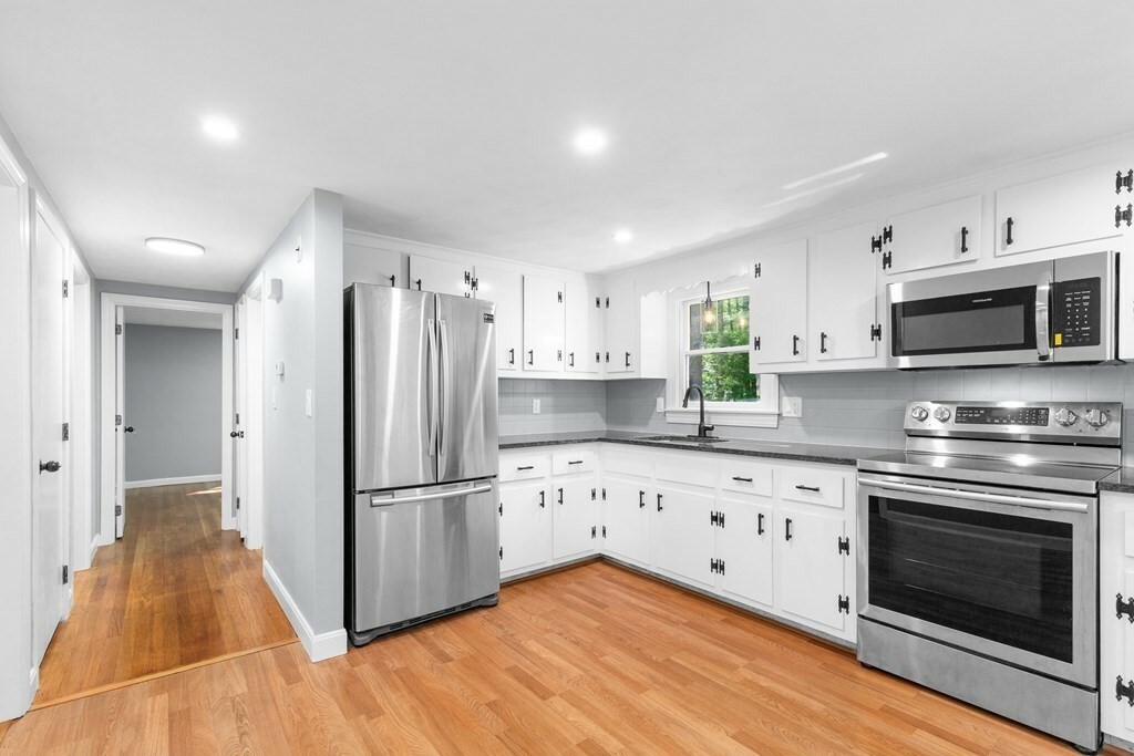 Property Photo:  112 Plymouth St  MA 02338 