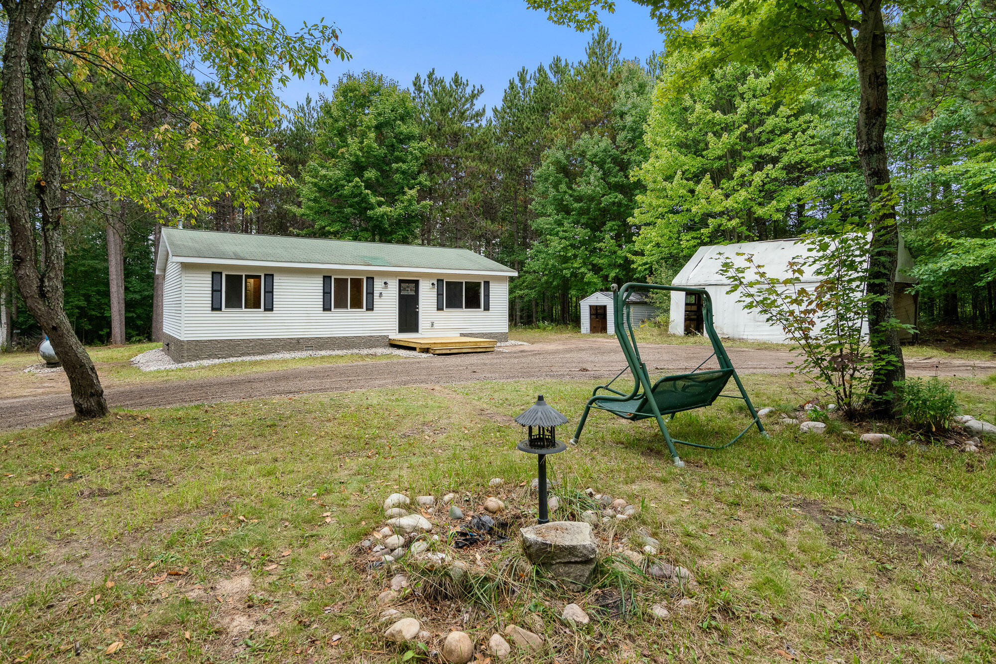 Property Photo:  7600 Osmun Road  MI 49705 