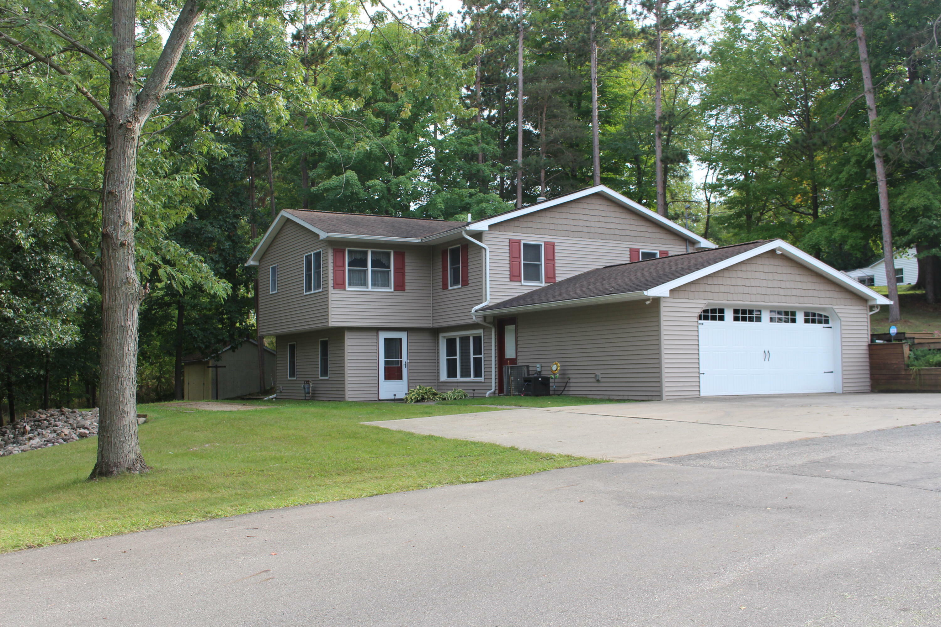 Property Photo:  129 Pinecrest Drive  MI 49250 