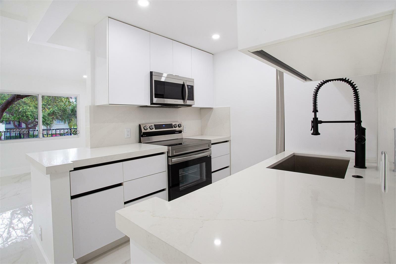 Property Photo: 13250 SW 7th Ct 204L FL 33027