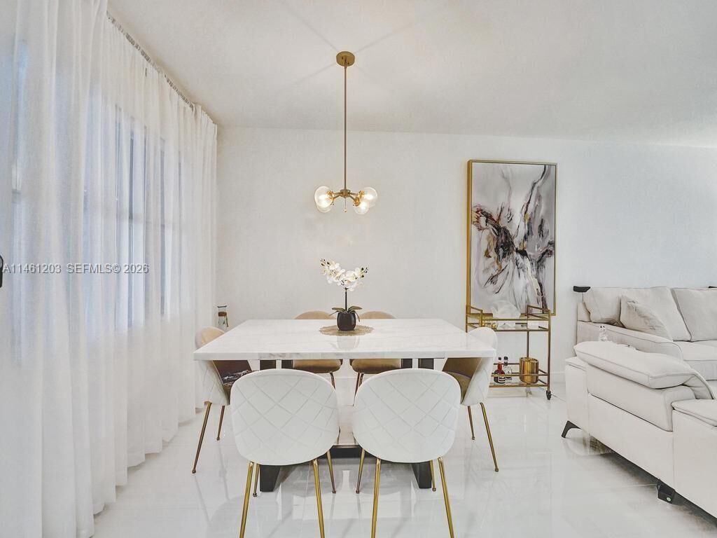 Property Photo:  300 Golden Isles Dr 312  FL 33009 