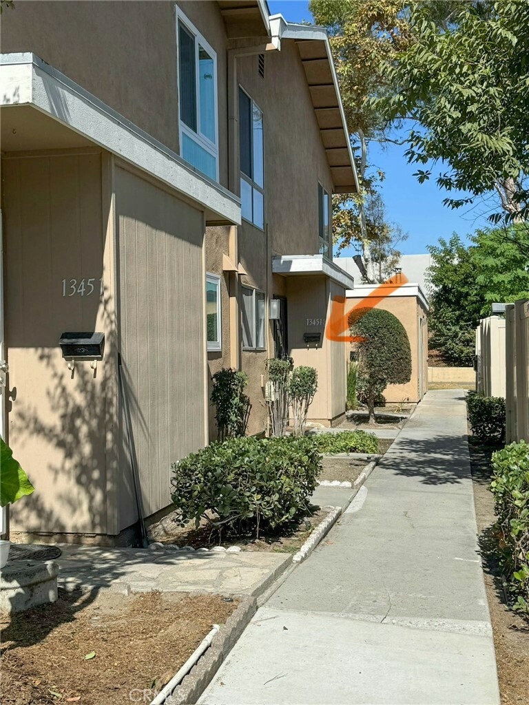 Property Photo:  13451 Village Drive 1/2  CA 90703 