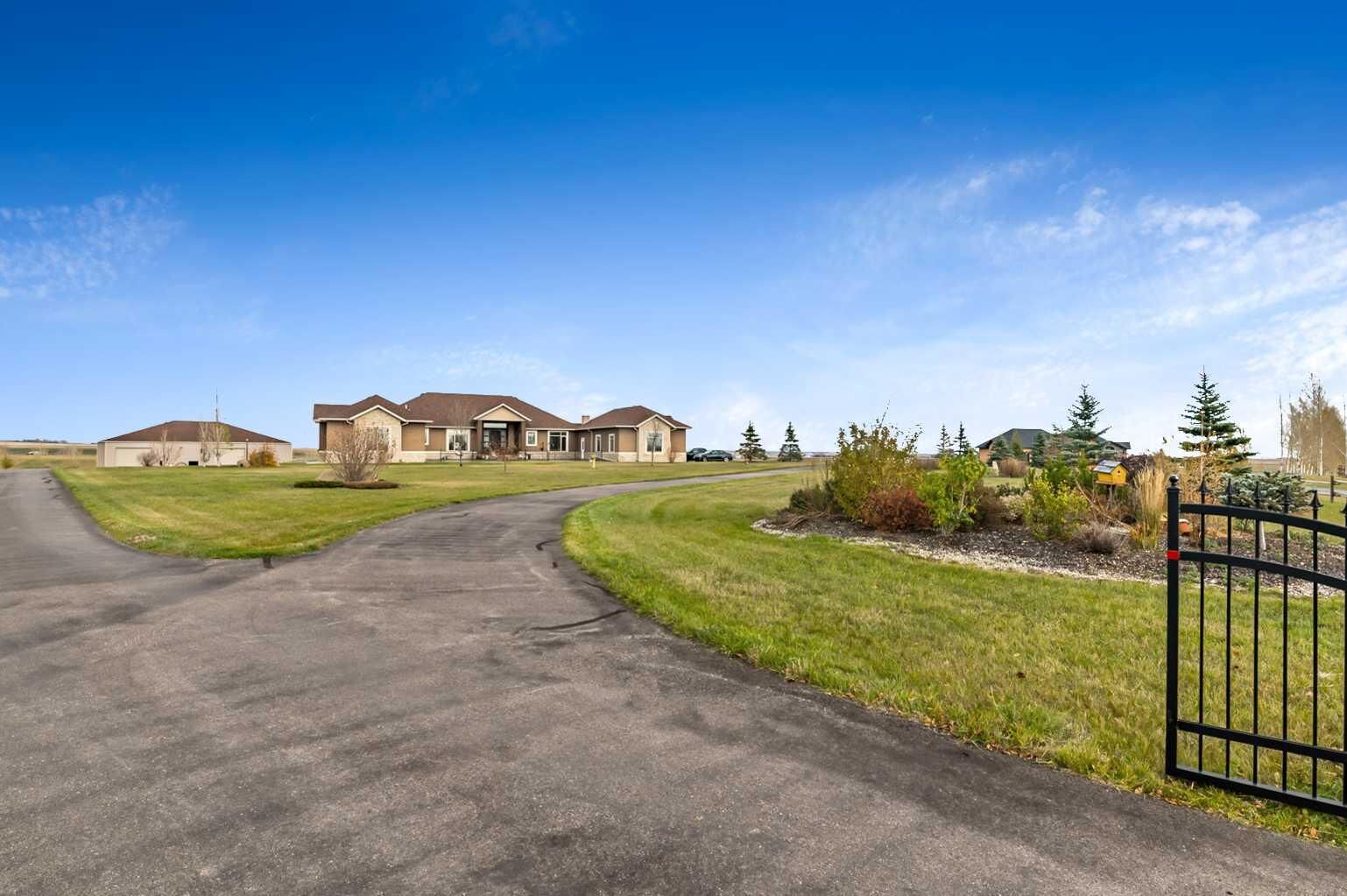 Property Photo: 48076 Sharall Circle E AB T1V 1N1