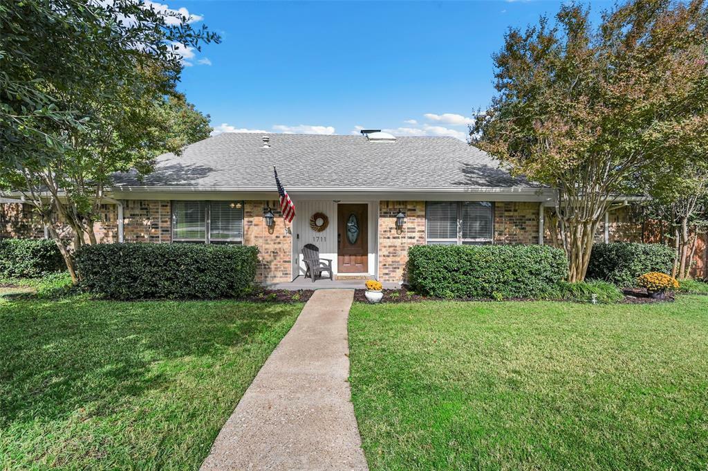 Property Photo:  1711 Woodcreek Drive  TX 75082 