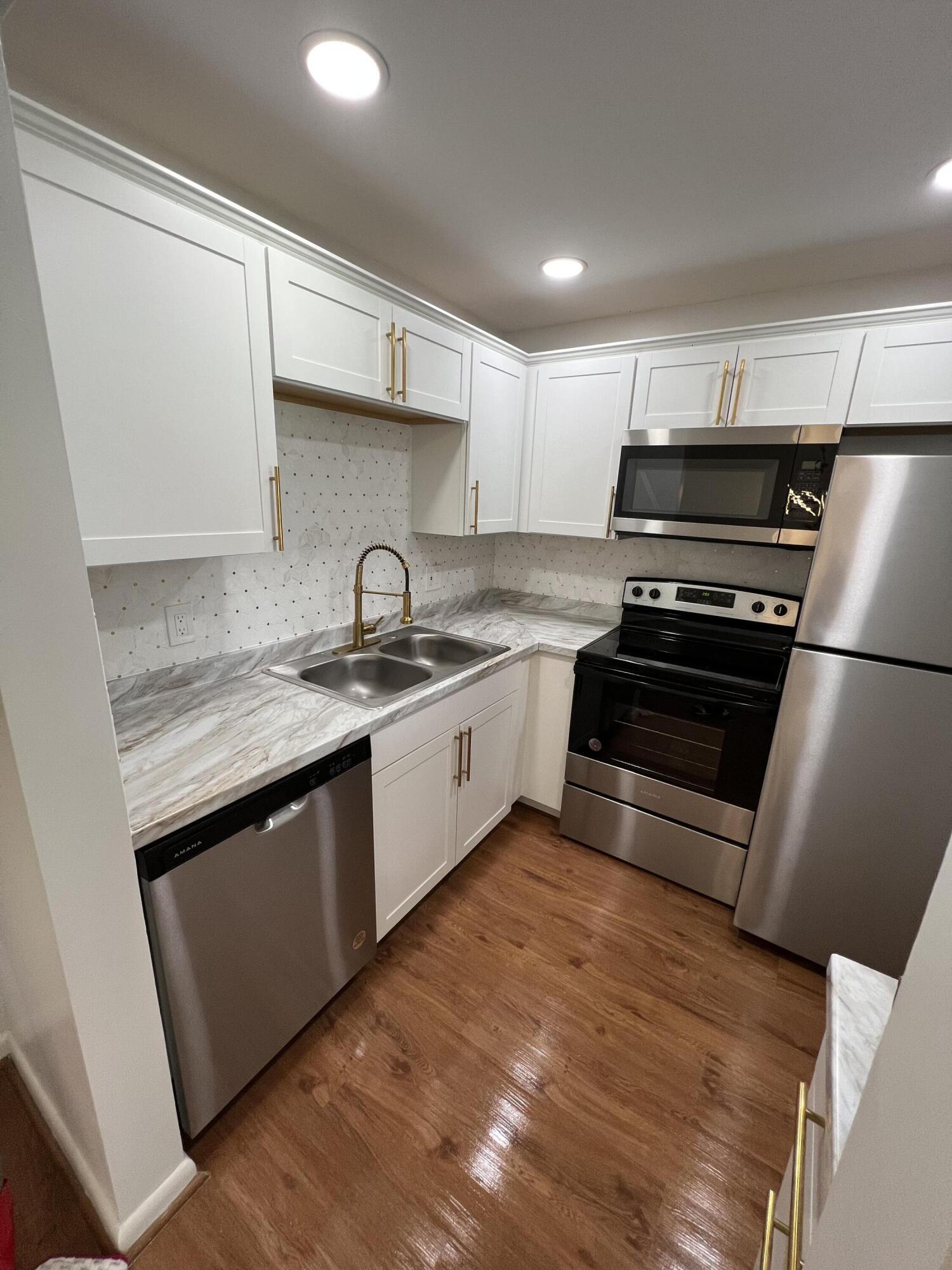 Property Photo:  54 Dorchester C  FL 33417 