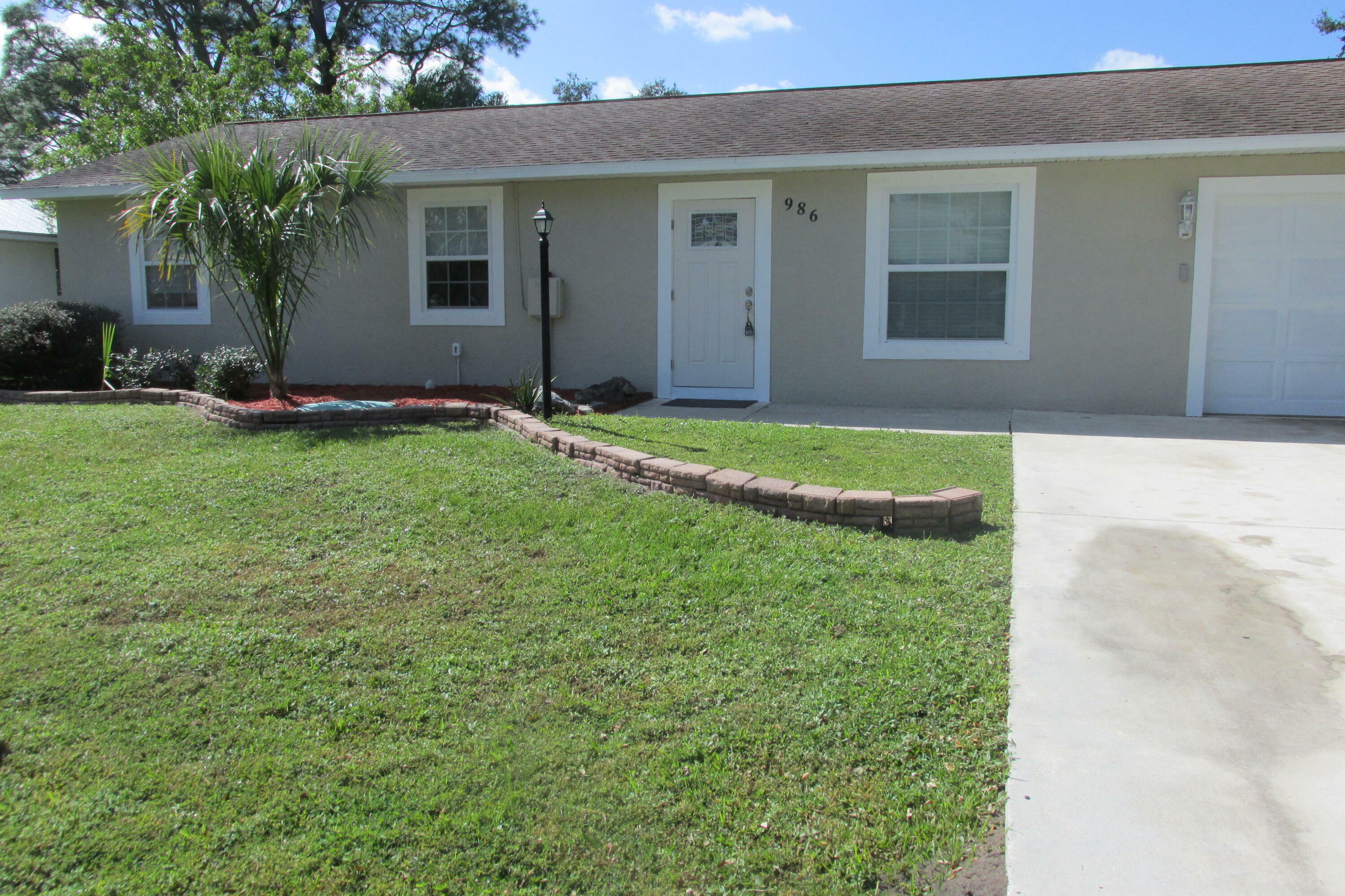 Property Photo:  986 SE Proctor Lane  FL 34983 