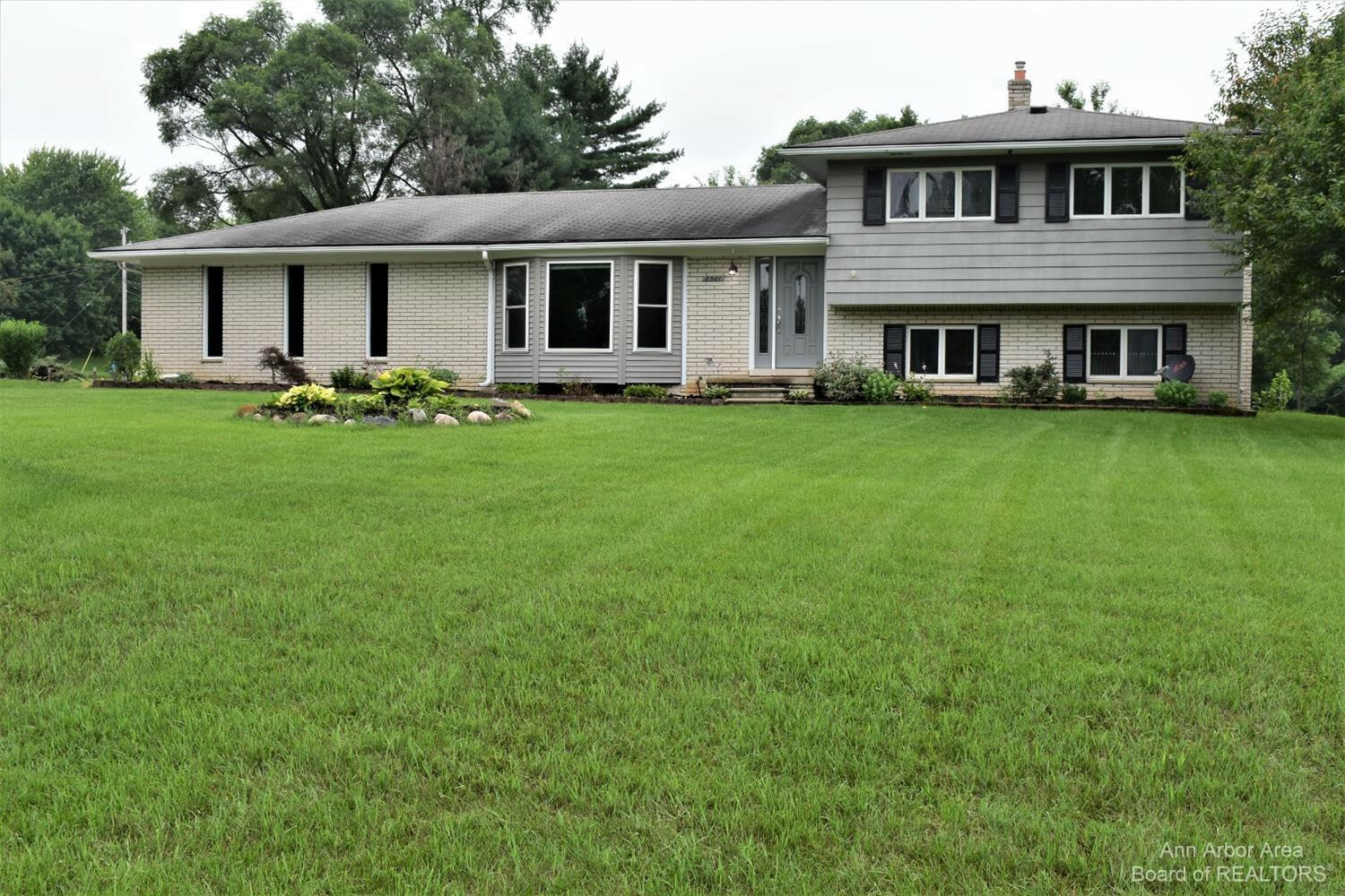 Property Photo:  8301 Stoneham Drive  MI 48197 