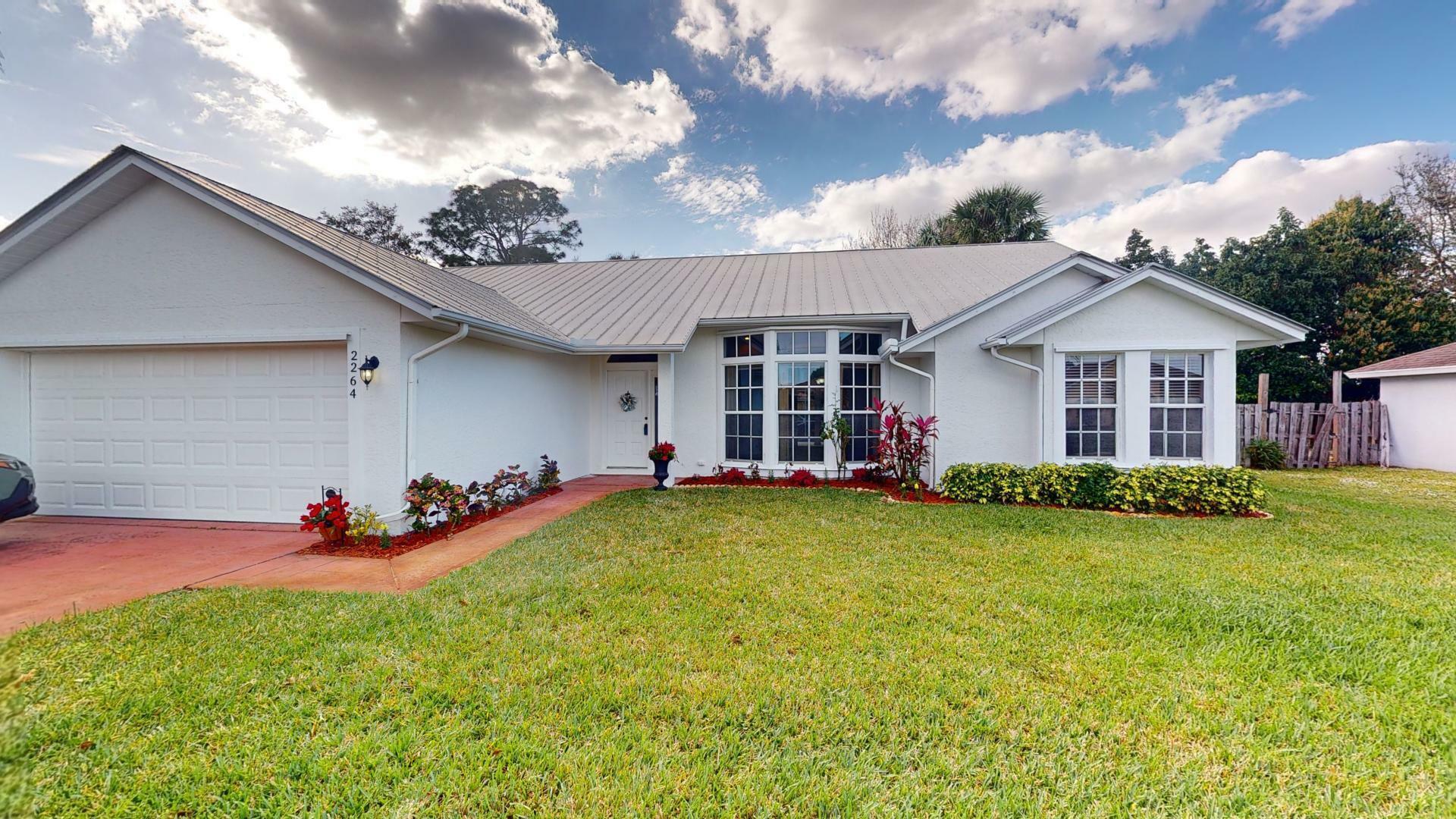 Property Photo:  2264 SW Lawrence Street  FL 34953 