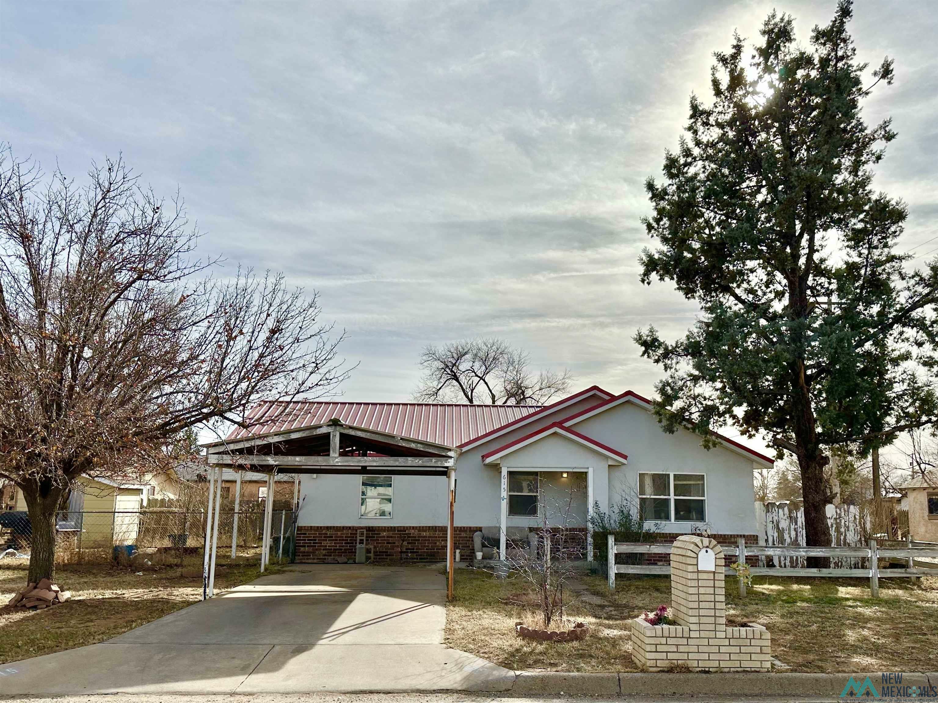 Property Photo:  615 E 12th Street  NM 88101 