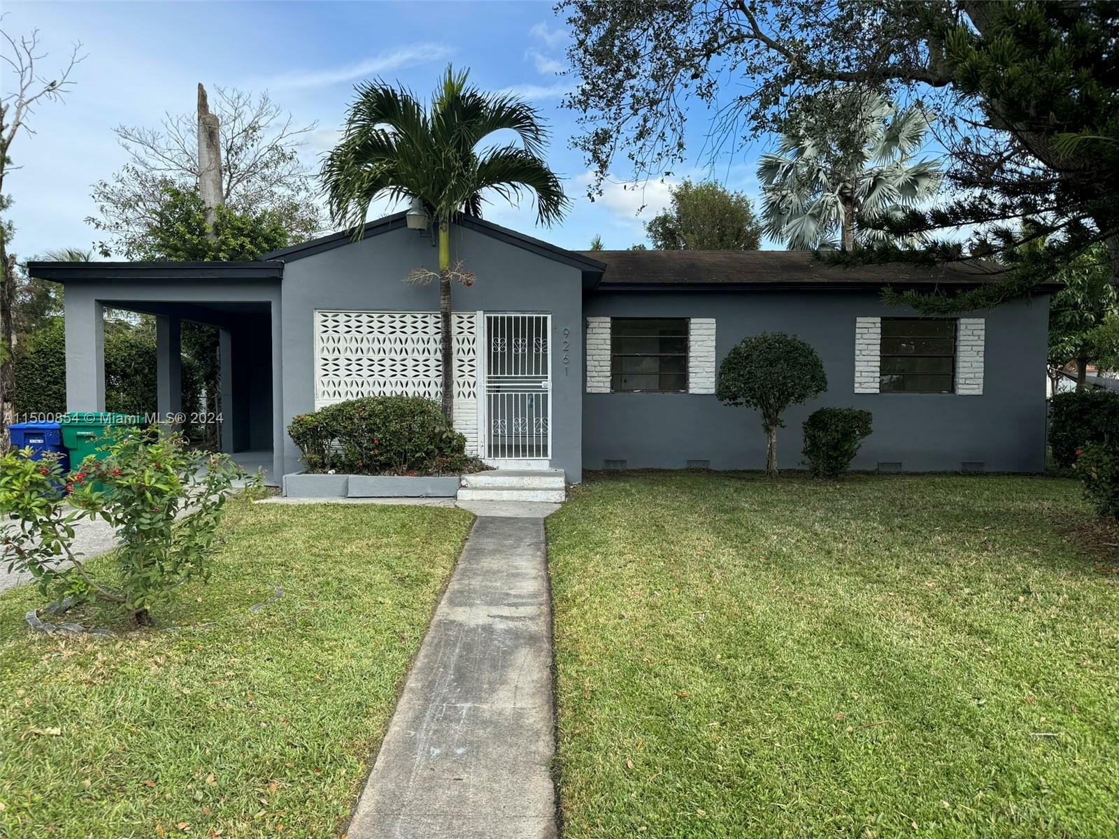 Property Photo:  9261 Little River Blvd  FL 33147 