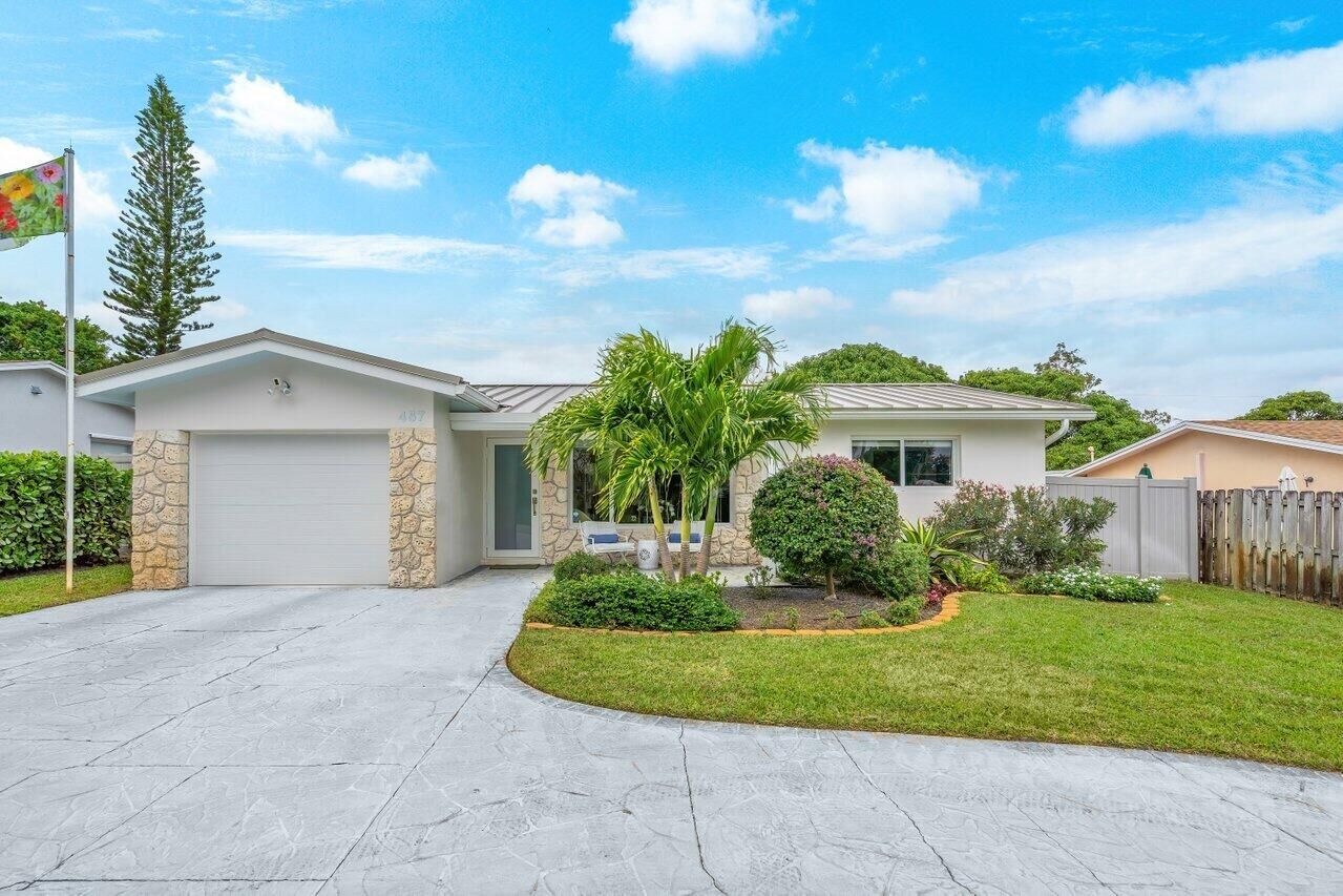 Property Photo:  457 SW 4th Avenue  FL 33435 